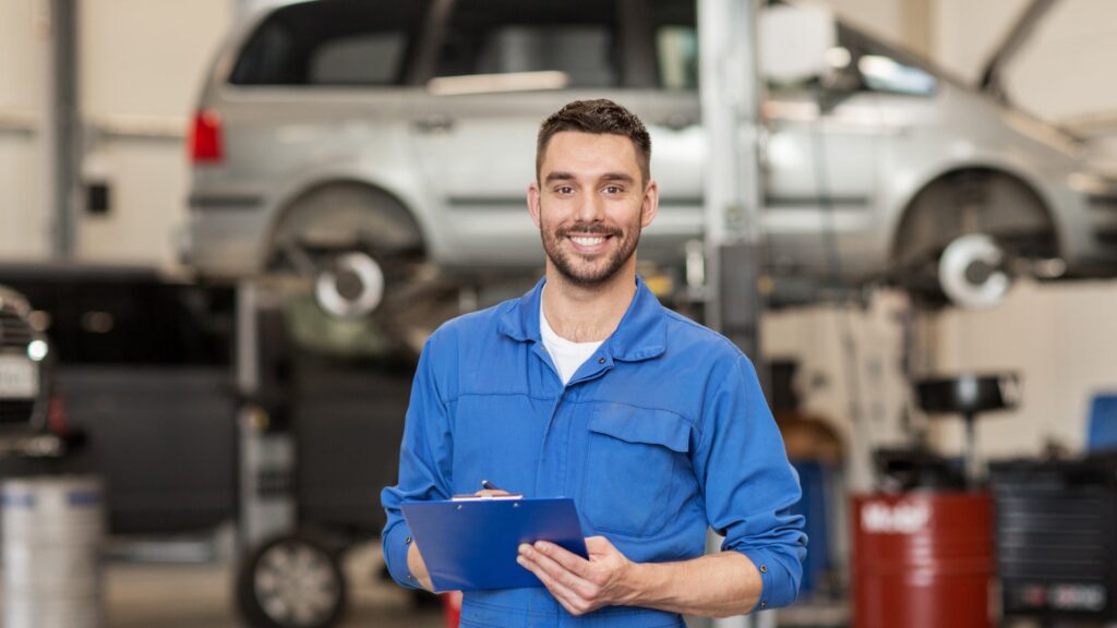 Mechanic talking on phone